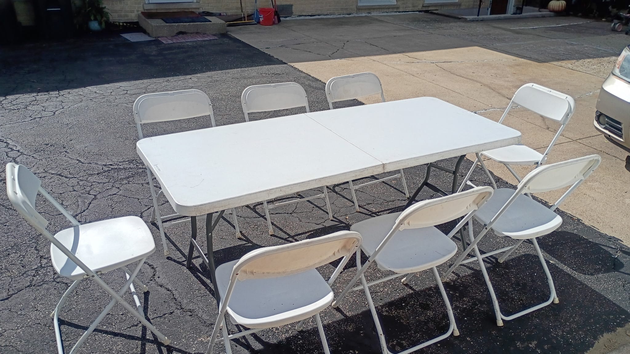 White table and chair setup for event in Wood Dale
